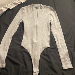 Fashion nova zip up thong body suit